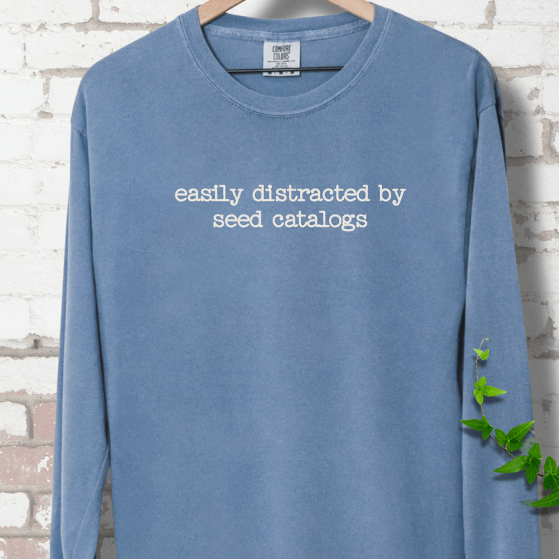Distracted by Seed Catalogs Long Sleeves