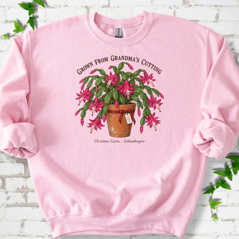 Grandma’s Cutting Christmas Cactus Sweatshirt in Light Pink – PlotlyGarden