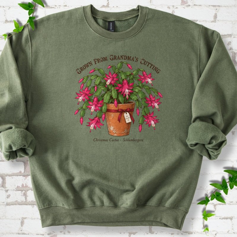 Grandma’s Cutting Christmas Cactus Sweatshirt in Military Green – PlotlyGarden
