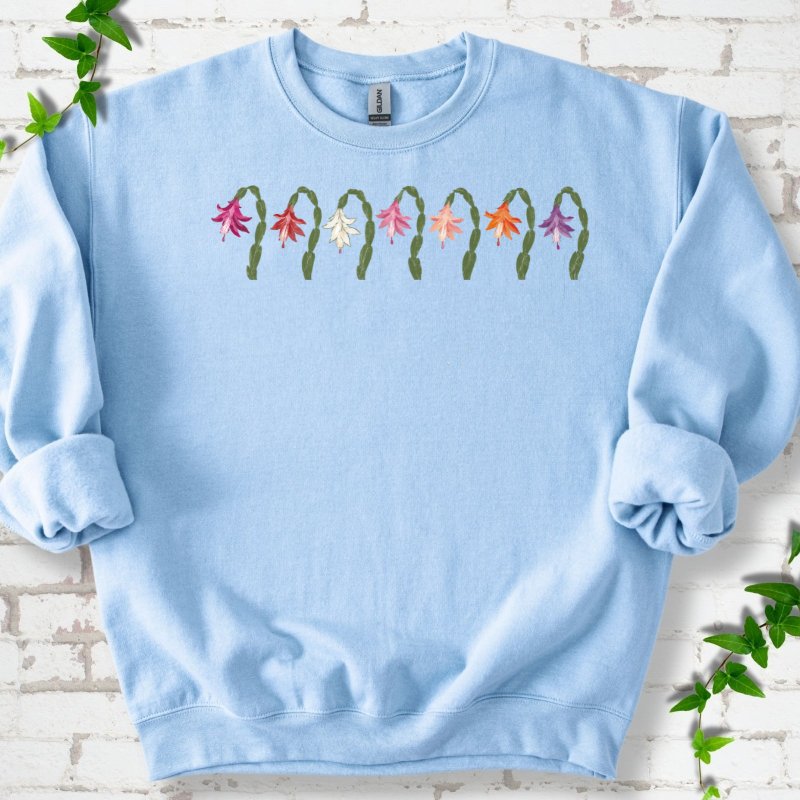 Seven Arched Christmas Cactus Blooms Sweatshirt in Light Blue – PlotlyGarden