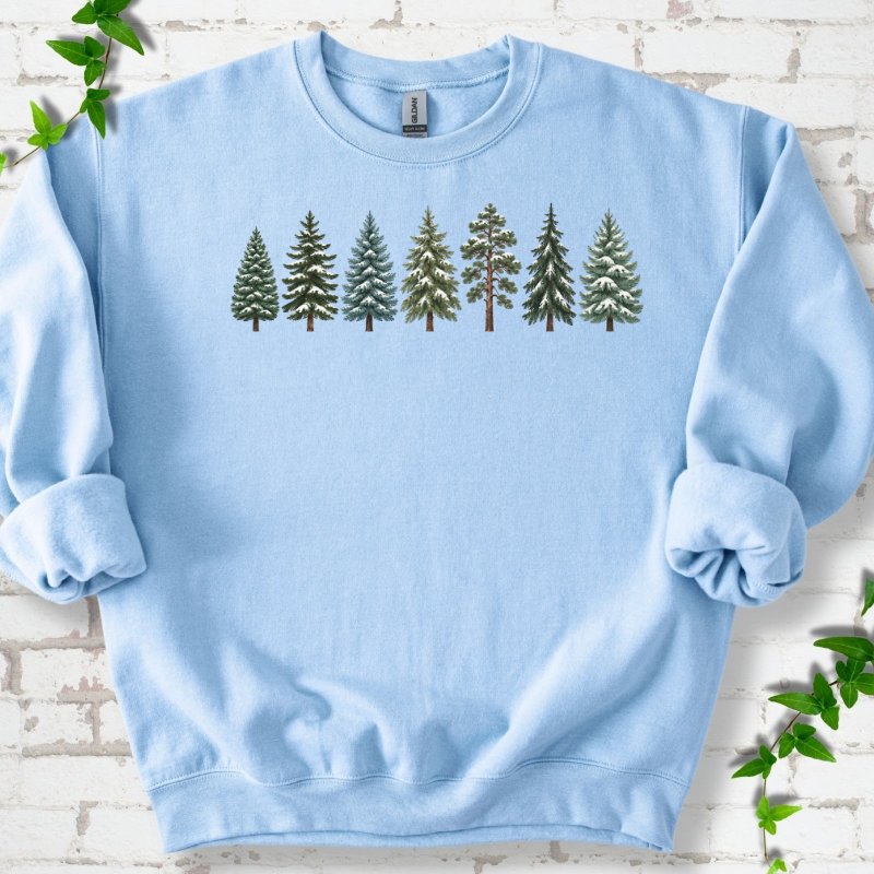 Seven Snow Dusted Conifers In A Row Sweatshirt in Light Blue – PlotlyGarden